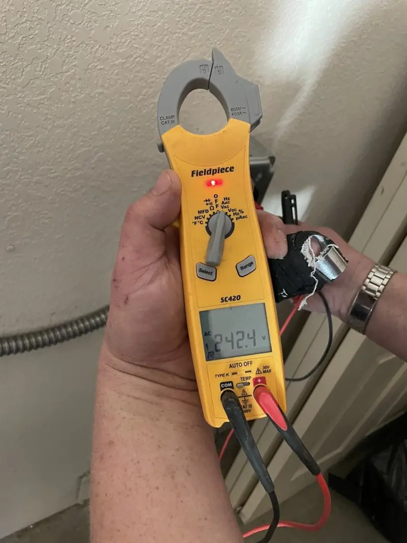 Voltage testing with clamp meter during Generator Installation in Monterey Park